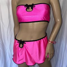 Two Piece Tube Top And Mini Skirt Set Is Made Of High-Quality Spandex Fabric. Chinese Frog Closure Detail On The Top And Skirt. Many Sizes And Colors Available. #Tubetop #Miniskirt#Hotpink #Raveset#Hotpink Trendy Stretch Pink Mini Skirt, Trendy Pink Stretch Mini Skirt, Pink Swim Skirt For Spring Party, Pink Flirty Skirt For Club, Pink Party Swim Skirt For Spring, Pink Flirty Club Skirt, Flirty Pink Skirt For Clubbing, Flirty Pink Skirt For Club, Pink Stretch Skirt For Night Out