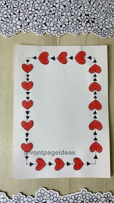 a piece of paper with hearts and arrows drawn on it