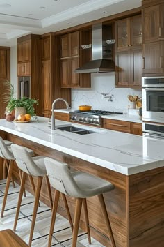 a kitchen with wooden cabinets and white marble counter tops, along with bar stools