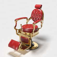 a red and gold barber chair sitting on top of a table