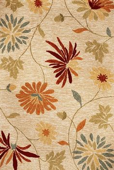 an area rug with flowers and leaves on the floor in beige, red, yellow and green colors