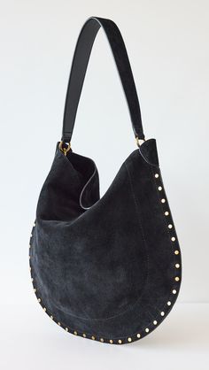 Find ISABEL MARANT ÉTOILE Oskan Hobo Soft Bag on Editorialist. Calfskin suede. Whipstitch trim. Matching zip pouch included. Magnetic snap. Textile lining. Weight: 24oz / 0.68kg. Imported, Tunisia. Measurements: Height: 15.25in / 39cm Length: 17.25in / 44cm Handle drop: 4.25in / 11cm Chic Shoulder Bag With Suede Lining And Double Handle, Chic Tote Shoulder Bag With Suede Lining, Luxury Everyday Suede Bucket Bag, Chic Double Handle Shoulder Bag With Suede Lining, Luxury Suede Bucket Bag For Everyday, Designer Soft Leather Hobo Tote Bag, Designer Suede Shoulder Bag With Gold-tone Hardware, Designer Hobo Bag With Leather Handles For Everyday, Chic Suede Hobo Bag With Suede Lining