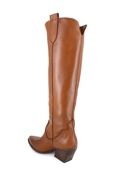 Add unmistakable Western flair to your look with this knee-high suede boot set on a block heel. 2 1/2" heel 15 1/2" shaft; 14 1/2" calf circumference Leather upper, lining and sole Made in Italy Knee High Western Boots, 70s Boho, Suede Boots Knee High, Steel Blue, Suede Boots, Western Boots, Knee High Boots, Tan Leather, Rocker