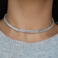 Beautiful, High Quality Adjustable Tennis Choker Necklace Featuring Baguette Cubic Zirconia Stones. A Sophisticated Necklace To Add Glam To Your Look! Available In Silver Or Gold Metal Alloy With Silver Or Gold Plating Highest Quality Cubic Zirconia Stones Adjustable Length: Longest Is 16.5", Shortest Is 13.5" Easily Adjustable (3" Extender) Thickness: 5mm This Item Is Plated To Resist Against Tarnishing. Over Time, Plated Jewelry May Tarnish And To Prevent This, We Recommend Avoiding Exposure T Silver Diamond Baguette Cut Tennis Necklace, Silver Tennis Necklace With Diamond Accents For Party, Party Silver Tennis Necklace With Diamond Accents, Elegant Silver Tennis Necklace With Bling, Silver Tennis Necklace With Baguette Diamonds, Silver Tennis Necklace With Rhinestones, Glamorous Silver Jewelry With Baguette Diamonds, Silver Tennis Necklace With Baguette Diamonds As Gift, Silver Cubic Zirconia Baguette Cut Necklace