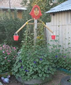 a garden with flowers and plants in it