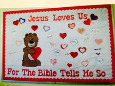 a bulletin board with jesus loves us for the bible tells me so