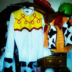 two costumes are hanging on a wall next to a dresser and mirror, one is wearing a yellow shirt with red trim