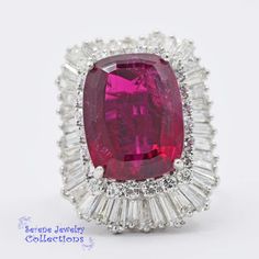 Beautiful large red tourmaline vintage ring! Set in platinum with lots of sparkly white baguette diamonds totaling 5.27 carats! Ring Size: 4.5 Total Weight: 20.2 grams Precious Metal: Platinum Precious stones: -Red Tourmaline center stone: 9 carats, 15.6mmx12.3mm -White Round Diamonds: 5.27 carats Hallmark: 10%IRID PLAT, RING DANT 5270 Luxury Red Baguette Diamond Jewelry, Luxury Ruby Ring With Baguette Diamonds, Red Ruby Ring With Baguette Diamonds, Luxury Silver Ruby Ring With Baguette Cut, Formal Ruby Ring With Baguette Diamonds, Anniversary Ruby Jewelry With Baguette Diamonds, Anniversary Jewelry With Baguette Diamonds And Ruby, Ruby Jewelry With Baguette Diamonds For Anniversary, Fine Jewelry Ruby Ring With Baguette Diamonds