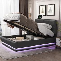 a bed that has been opened and is in the middle of a room