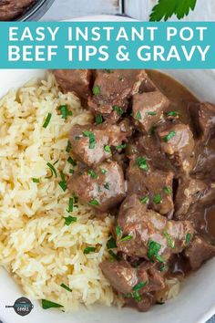 beef and gravy in a white bowl with rice on the side, garnished with parsley