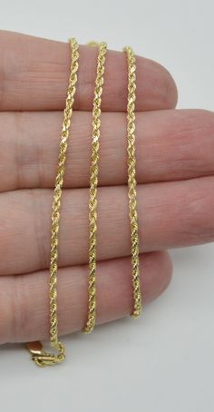 Welcome to Our Official eBay Store MENU Home Help Feedback Follow Us See What's New Home Help Feedback Follow Us See What's New Categories See All Products Jewelry & Watches Usefull Link View Store Add to Favourites Ask Question View Feedback Why Choose Us ? 10k Yellow Solid GOLD Hollow Rope Chain Necklace 2mm 18" - 24" DESCRIPTION 10k yellow solid gold hollow rope chain necklace 2mm 18" - 24" is crafted by hand with a glittering finish. Wear it solo or with your favorite pendant. Lobster clasp, 10k yellow gold rope chain necklace.   Chain Details: Style: Rope Chain Link Metal: 10K Solid Gold Metal Purity: 10K STAMP Thickness: 2 mm Lock: Lobster clasp Length's: 18"approx 2gr /20"approx 2.3gr / 22"approx 2.8gr / 24''approx3gr * Comes with a gift box   Contact Us We are happy to help you wit Gold Rope Chain Necklace, Round Shape, Gold Rope Link Chain Necklace With Lobster Clasp, Gold Rope Chain Necklace With Lobster Clasp As Gift, Gold Rope Chain Necklace, Rope Chain Necklace, Gold Rope Chains, Jesus Christus, Rope Necklace, Fine Jewellery Necklace