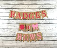 two bunting banners that say baddes or bow's on the front and back