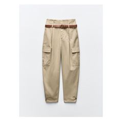 Pants with a high waist with belt and pleats. Front pockets and side patch pockets with flaps. Adjustable hem with button. Front zip, interior button and hook closure. Celana Kargo, Cargo Pants Women, Cargo Trousers, High Waisted Trousers, T-shirt Polos, Trouser Jeans, Linen Shirt, High Waisted Pants, Jeans Pants