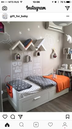 an instagram photo of two twin beds in a child's room with white and gray walls