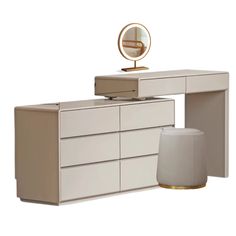 a white dresser with two drawers and a round mirror on it's top shelf