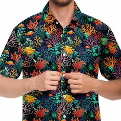 Expertly crafted with a vibrant sea ocean beach tropical fish print, this Coral Reef Short Sleeve Men Button Up Shirt is perfect for any casual summer occasion. Made with high-quality materials, this buttoned down collared dress shirt offers both style and comfort. Upgrade your wardrobe with this must-have shirt. Stay cool with this fun printed short sleeve button down shirt. It comes in a regular width and spread collar. Perfect for those dressier hot days. * Fabric: 100% Polyester Poplin * Cot Black Hawaiian Shirt With Button Closure For Summer, Black Button-up Camp Shirt For Beach, Black Button-up Camp Shirt For The Beach, Summer Hawaiian Beach Shirt Button-up, Hawaiian Patterned Shirt For Vacation, Patterned Hawaiian Shirt For Vacation, Summer Beach Hawaiian Shirt With Button Closure, Summer Hawaiian Button-up Shirt For Vacation, Summer Vacation Hawaiian Button-up Shirt