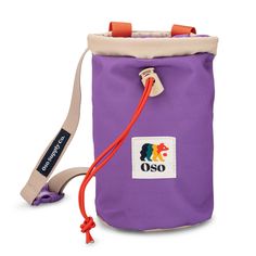 a purple bag with an orange handle on the side and a red cord attached to it