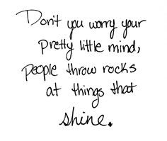 a handwritten note with the words don't you worry your pretty little mind people throw rocks at things that shine