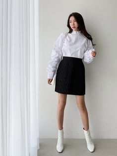 Cotton blouse with high ruffle collar. Ruched balloon-like long sleeves with wide cuff. Model is in MINUSEY ONE SIZE. Please allow 5-12 days shipping when in restocking. * MINUSEY ONE SIZE = EU 34-38, US 2-6* 100% Cotton* Dry clean* Made in Korea - Model Height: 170cm/5'7" (US2, EU34) White Long Sleeve Blouse With Pleated Sleeves, White Long Sleeve Pleated Top, White Pleated Long Sleeve Top, Ruched Sleeve, Wide Cuff, Ruffle Collar, Cotton Blouse, Cotton Blouses, Sleeve Cotton