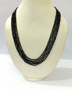 Black Spinel Necklace, Black Spinel 3-4mm Rondelle Faceted Beads Jewelry Necklace, Black Spinel 5 Strand Jewelry Necklace Gemstone :- Black Spinel Size :- 3-4mm Approx. Strand :- 5 Strand Shape :- Rondelle Faceted Color :- Black Quality :- AAA GRADE https://www.etsy.com/in-en/shop/LatestBeadsJewellery?ref=simple-shop-header-name&listing_id=720939504 Your Feedback is very Important for us. If you have any problem regarding packaging or product, kindly contact us to resolve the issue before leavin Luxury Black Spinel Necklaces For Formal Occasions, Black Spinel Jewelry Jtv, Black Multi-strand Necklace With Faceted Beads, Elegant Black Rondelle Beaded Necklaces, Elegant Black Faceted Beads, Elegant Black Beaded Necklace With Tiny Beads, Black Faceted Beaded Necklaces For Party, Black Necklace With Tiny Beads For Party, Black Tiny Beads Necklace For Party