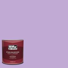 a can of behr ultra stain - blocking paint on a lilac background,