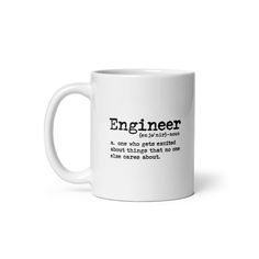 a white coffee mug with an english definition on the front and bottom, says engineer