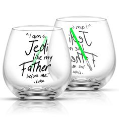 two wine glasses with words written on them