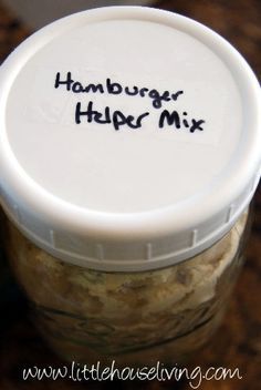 a close up of a jar of food with the words hamburger help mix written on it