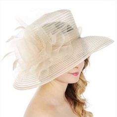 Dress Hat With Bow And Feather Cream Weight 2.6oz Size: Brim 5" X Crown Height 5" X Crown Diameter 7.5" 100% Polyester Beige Church Hat For Spring, Spring Beige Hat For Church, Beige Spring Church Hat, Formal Fedora Hat For Spring, Spring Formal Fedora Hat, Formal Spring Fedora Hat, Spring Beige Hat For Formal Occasions, Spring Formal Beige Hat, Chic Beige Hats