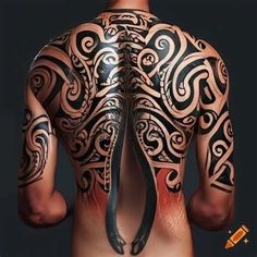 the back of a man with tattoos on his body