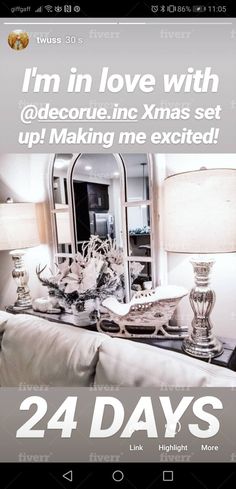 an advertisement for a living room with white furniture and lamps on the table, in front of a mirror that says i'm in love with @ decor inc xmas set up making me excited 24 days