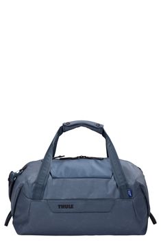 a blue duffel bag on a white background