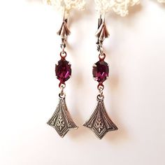 These beautiful delicate earrings breathe style and sophistication and class. I used vintage Swarovski amethyst gems and sterling silver plated intricate drops to create this piece.  The earrings are about 35mm long from the bottom of earwires. Matching locket can be found here - https://www.etsy.com/au/listing/249477197/amethyst-lace-victorian-style-locket?ga_search_query=purple&ref=shop_items_search_2 Sterling Silver Jewelry With Lever Back For Formal Occasions, Formal Sterling Silver Jewelry With Lever Back, Antique Silver Dangle Earrings For Wedding, Ornate Purple Jewelry With Matching Earrings, Ornate Purple Sterling Silver Earrings, Elegant Sterling Silver Jewelry With Lever Back, Nickel-free Classic Crystal Earrings For Wedding, Vintage Teardrop Crystal Earrings For Formal Occasions, Vintage Crystal Teardrop Earrings For Formal Occasions