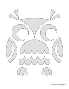 an owl is shown in the shape of a paper cutout