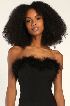 Feather TogetherThis strapless crop top was made for you with its figure-hugging stretch knit fabrication that falls from a straight neckline, adorned with fluffy black feathers. Hidden side zipper. Pair with the matching pants for a complete look! Fit: This garment fits true to size. Length: Size medium measures 12.5" from top to bottom. Bust: Great for any cup size. Waist: Fitted - very fitted at natural waist. Undergarments: May be worn with a strapless bra, adhesive bra, petals, or no bra. F Black Crochet Crop Top, Light Blue Crop Top, Ruffled Crop Top, White Lace Crop Top, Feather Tops, Strapless Crop Top, Weekend Outfits, Hoco Dress, Puff Sleeve Crop Top