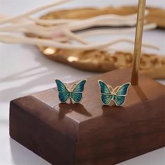 Description: Enamel Butterfly Earrings Specifications:Size: 13 mm * 10 mmWeight: 5 g/pairMaterial: Copper, Enamel, GoldColor: Green Add some fun and whimsy to your outfit with our Enamel Butterfly Earrings! Perfect for any occasion, these quirky earrings are sure to make a statement. Fly into style with these unique accessories.