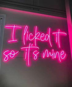 a neon sign that reads, i kicked it so its mine