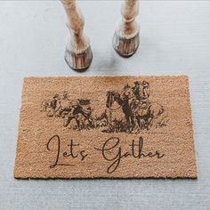 a door mat with the words, let's glither on it next to a pair of shoes