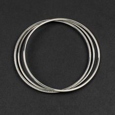 Silver 304 Stainless Steel 2x60mm Small Bangle Bracelet Set - 3 bracelets - Stainless steel won't tarnish and is perfect for your next jewelry design. Each bracelet is approximately 2mm thick.Inner Diameter approx. 2.3in Stainless Steel Bracelets, Bracelets, Stainless Steel Bracelets, Cherry Tree Beads, Silver 304 Stainless Steel 2x60mm Small Bangle Bracelet Set - 3 bracelets Stackable Round Metal Bracelets, Stackable Metal Round Bracelets, Flexible Silver Metal Bangle, Minimalist Stackable Metal Bracelets, Minimalist Nickel-free Metal Bracelets, Minimalist Metal Stackable Bracelets, Hypoallergenic Metal Bracelets For Jewelry Making, Silver Stainless Steel Bangle Bracelet, Silver Flexible Round Bangle