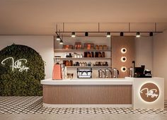 the inside of a coffee shop with lights and plants on the wall behind the counter