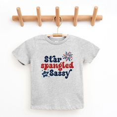 Looking for a cute tee for your kids? We have the perfect Star Spangled Firework graphic tee addition to their closet! Also available in youth tees. Playful Crew Neck T-shirt For 4th Of July, Playful T-shirt For 4th Of July With Crew Neck, Cute 4th Of July Birthday T-shirt, Firework Graphic, Trending Graphic Tees, Star Spangled, Top Graphic Tees, Ribbed Tank Tops, Kids Outfits Girls