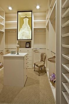 the closet is clean and ready to be used as a dressing room for brides