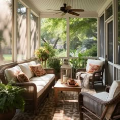 a screened porch with wicker furniture and potted plants