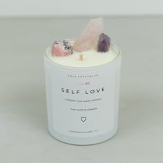 a candle that has some rocks in it