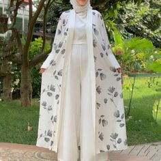 Casual Spring Abaya, Spring Casual Maxi Length Abaya, Casual Long Sleeve Summer Abaya, Modest Long Abaya For Summer, Summer Long Sleeve Abaya, Casual Long Abaya For Spring, Spring Casual Long Abaya, White Long Sleeve Abaya For Spring, Casual Maxi Abaya For Summer