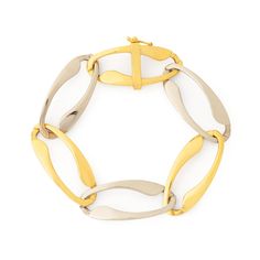 The Story A beautiful 18K yellow gold link bracelet that's as chic as they come. Made circa mid to late 20th century, the curb links sit flat against the wrist. The bracelet is comprised of six links each measuring 1.47" long x 0.62" wide, alternating between yellow gold white gold. The links are long and open giving the whole piece a light and airy design while still looking and feeling substantial. The perfect heft, it feels amazing on. Measuring 7 3/4" long, it's a great universal size. Bold Modern Gold Oval Link Bracelet With Polished Finish, Formal Gold Bracelet With Oval Link And Hooks, Formal Gold Oval Link Bracelet With Hook, Timeless Gold Bracelet With Curb Chain For Formal Occasions, Elegant Gold Chain Bracelet With Hooks And Links, Formal Yellow Gold Bracelets With Hook And Links, Modern Gold-tone Chain Bracelet For Formal Occasions, Formal Gold Jubilee Bracelet With Oval Link, Modern Yellow Gold Link Bracelet