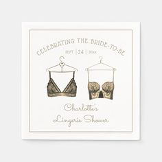 two bras with the words celebrating the bride to be printed on them in white paper