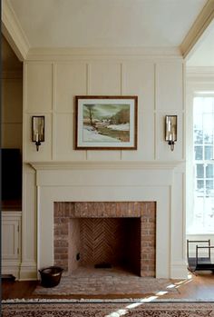 a living room with a fire place and fireplace