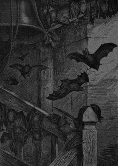 bats are flying over the top of a building with a bell in front of them