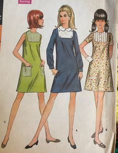 two women's dresses, one in blue and the other in green with white stripes